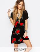 Reclaimed Vintage Cape Sleeve Dress With Large Scale Floral Print - Black