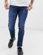 Hugo 734 Stretch Skinny Jeans In Mid Wash - Navy
