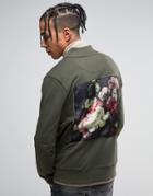 Criminal Damage Jersey Bomber Jacket In Khaki With Floral Back Print - Green
