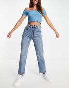 Cotton: On High Rise Straight Jean With Rip In Mid Wash-blues
