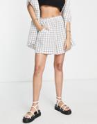 Asos Design Long Line Pull On Short In White Plaid - Part Of A Set