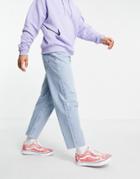 Asos Design Relaxed Tapered Jeans In Vintage Light Wash Blue With Raw Hem-blues