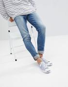 Asos Design Skinny Jeans In Vintage Mid Wash Blue