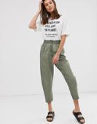 Asos Design Pleated Peg Pants In Oil Wash - Green