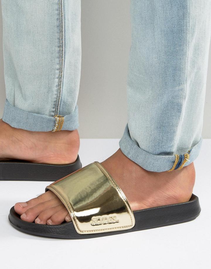 Slydes Slider Flip Flops In Chrome - Gold