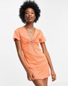 Asos Design Ribbed Short Sleeve Mini Dress With Ring Detail In Orange