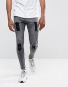 Illusive London Super Skinny Jeans In Acid Wash Black With Distressing - Black