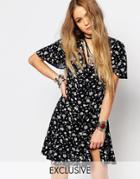 Reclaimed Vintage Button Front Mini Tea Dress With Ruffle Detail In Floral Print - Black