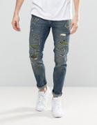 Asos Skinny Jeans In Mid Blue With Camo Rip & Repair - Blue