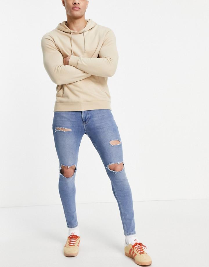 Asos Design Spray On Jeans With Power Stretch In Vintage Mid Wash Blue With Rips-blues