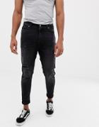Bershka Carrot Fit Jeans In Black With Rips And Hem Taping - Black