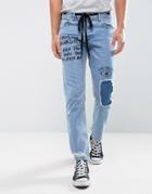 Asos Slim Jeans In Vintage Mid Wash Blue With Rips And Print - Blue