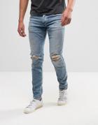 Jack & Jones Intelligence Skinny Jeans In Mid Blue Wash With Knee Rips