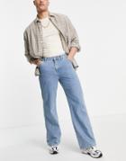 Asos Design Wide Hem Baggy Jeans In Mid Wash Blue-blues