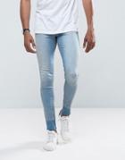 Asos Extreme Super Skinny Jeans In Light Wash With Hem Detail - Blue