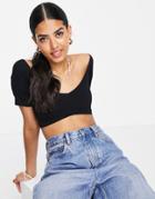 Asos Design Off Shoulder Top With Shaped Hem In Rib In Black