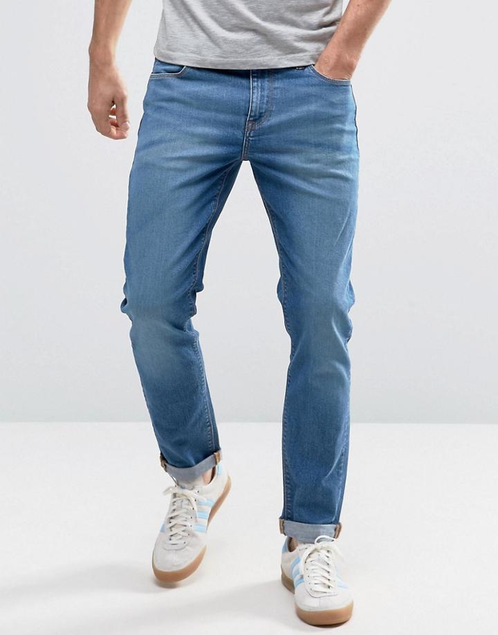 Asos Skinny Low Impact Jeans In Mid Blue - Blue
