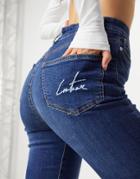 The Couture Club Logo High Waisted Skinny Jeans In Ripped Mid Blue-blues