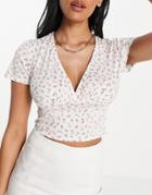 Asos Design Hourglass Wrap Crop Top With Cap Sleeve In White Floral