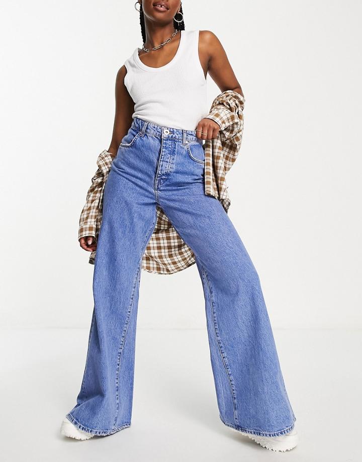 River Island Wide Leg Flared Jeans With Reworked Panel Detail In Medium Blue