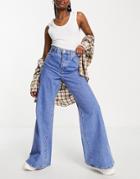 River Island Wide Leg Flared Jeans With Reworked Panel Detail In Medium Blue