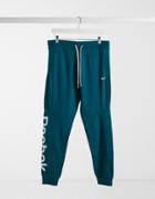 Reebok Linear Logo Sweatpants In Heritage Teal-blue
