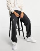 Asos Design Baggy Jeans In 'less Thirsty' Black Wash With Abrasions