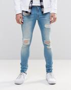Asos Extreme Super Skinny Jeans With Mega Rips In Mid Blue - Blue