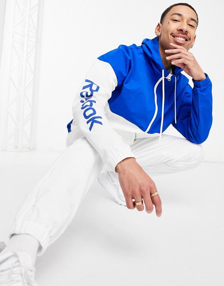 Reebok Te Linear Logo Windbreaker Jacket In Blue-blues