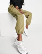 Asos Design 90s Cargo Pants With Toggle Detail In Washed Khaki-green