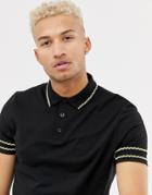 Asos Design Polo Shirt With Contrast Gold Sleeve Taping In Black - Black