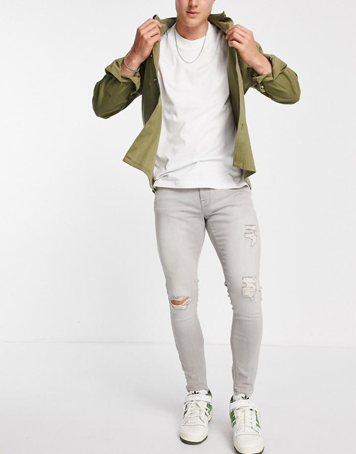 Asos Design Spray On Jeans With Power Stretch In Gray With Rips-grey