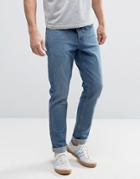 Asos Slim Low Impact Jeans In Mid Blue - Blue
