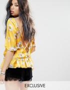 Milk It Vintage Short Sleeve Top With Ruffle Hem And Deep V Strappy Back In Festival Daisy Print - Yellow