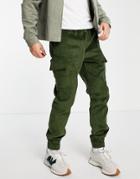 Asos Design Tapered Fit Cargo Pants In Khaki Cord-green