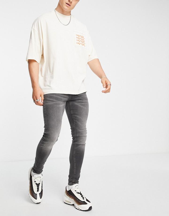 Asos Design Organic Cotton Blend Spray On Jeans With Powerstretch In Washed Black