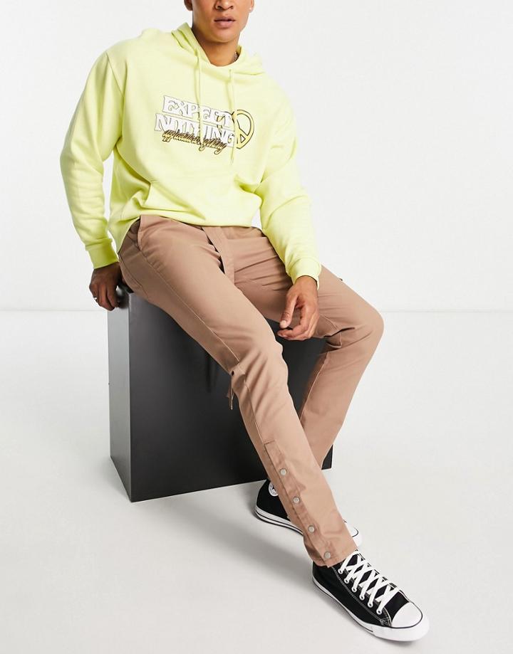 Asos Design Slim Fit Pants With Stacked Hem And Snap Opening In Brown