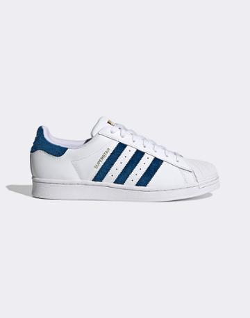 Adidas Originals Superstar Sneakers In White With Blue Detail