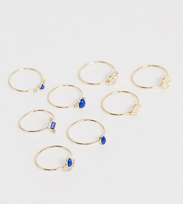 Asos Design Curve Pack Of 8 Rings With Engraved Coin Details And Blue Stones In Gold Tone