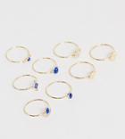 Asos Design Curve Pack Of 8 Rings With Engraved Coin Details And Blue Stones In Gold Tone