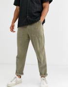 Asos Design Relaxed Cord Pants With Utility Pockets In Washed Khaki-green