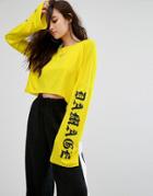Criminal Damage Long Sleeve Crop Top T-shirt With Arm Graphic - Yellow