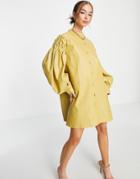 Ghospell Mini Collarless Shirt Dress With Puff Sleeves In Mustard Faux Leather-yellow