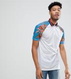Asos Design Tall Longline Polo With Floral Sleeve And Tipped Collar In Pique - White