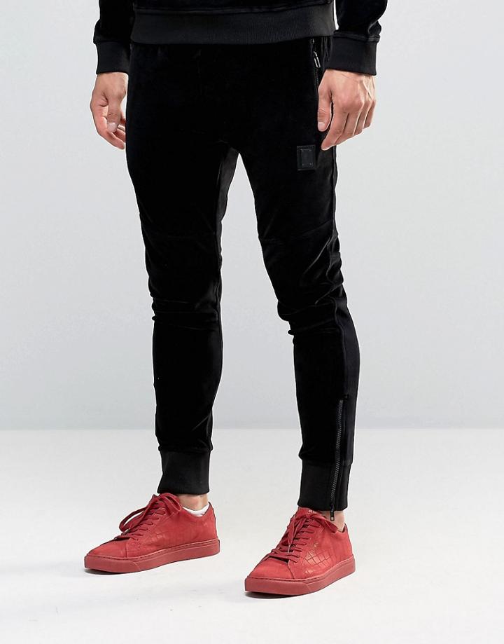 Religion Jersey Joggers In Slim Fit With Metal Badge And Zip Cuff - Black