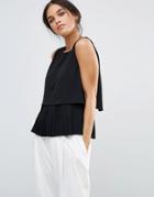 Amy Lynn Sleeveless Top With Peplum Hem - Black