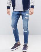 Asos Extreme Super Skinny Jeans With Rips In Mid Wash - Blue