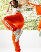 Asos Weekend Collective Oversized Sweatpants With Varsity Print In Orange