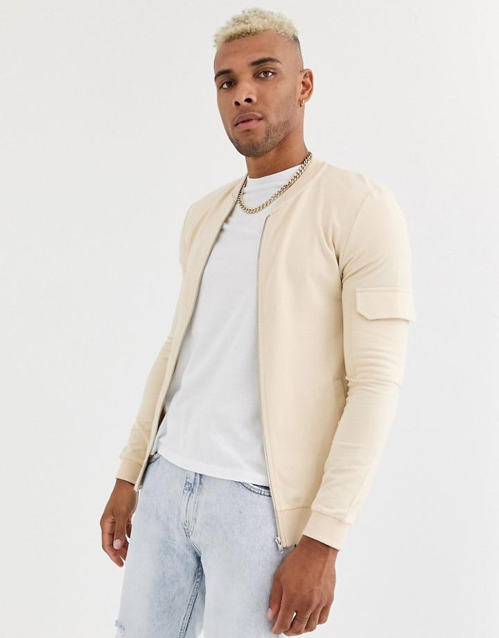 Asos Design Jersey Muscle Bomber Jacket With Utility Sleeve Pocket In Beige