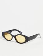 Asos Design Mid Oval Sunglasses In Black With Yellow Lens